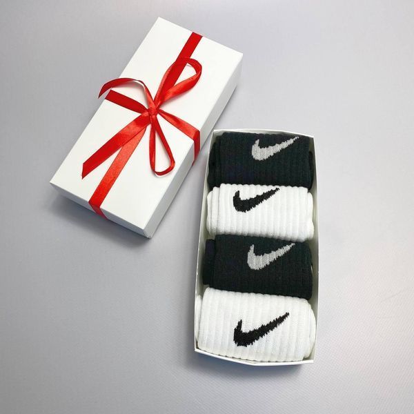 Набір чоловічих високих шкарпеток Nike 41-45 на 4 пари у подарунковій коробці із стрічкою